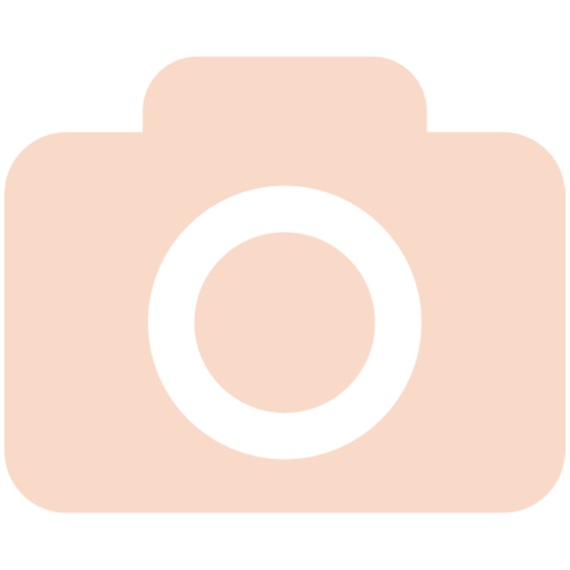 Peach-colored camera icon with a circular lens design.